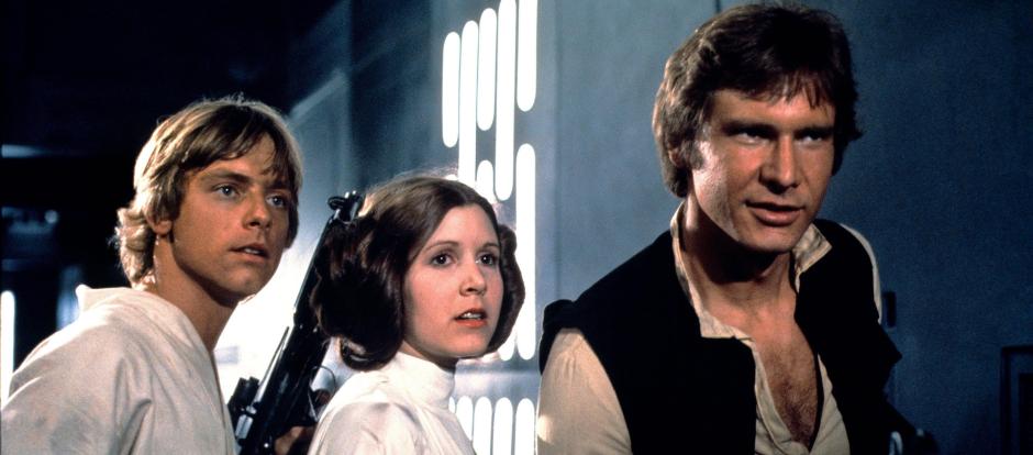 Mark Hamill, Carrie Fisher, Harrison Ford en un fotograma de <i>Star Wars</i>