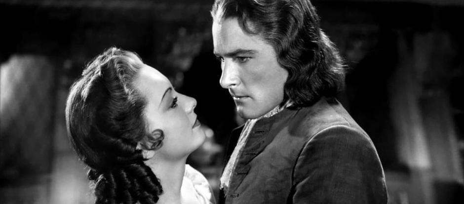 Errol Flynn y Olivia de Havilland, en <i>El capitán Blood</i>