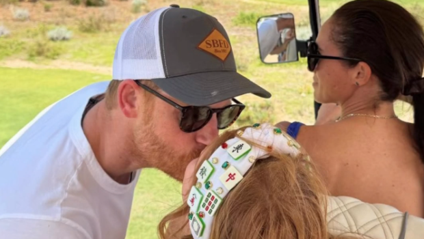 El Príncipe Harry con Meghan Markle y su hija