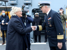(FILES) In this file photo taken on December 17, 2021 German Defence Minister Christine Lambrecht (C-L) is welcomed by vice-admiral Kay-Achim Schoenbach onboard the corvette 