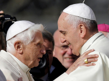 Pope Francis, right, greets Pope Emeritus Benedict XVI at the end of a meeting with elderly faithful  at the Vatican, Sunday, Sept. 28, 2014.