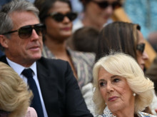 Britain's Queen Camilla looks on in the royal box of Centre Court for the women's singles quarter-final tennis match between Russia's Mirra Andreeva and Switzerland's Belinda Bencic on the tenth day of the 2025 Wimbledon Championships at The All England Lawn Tennis and Croquet Club in Wimbledon, southwest London, on July 9, 2025. (Photo by Glyn KIRK / AFP) / RESTRICTED TO EDITORIAL USE