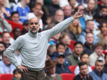 Manchester City's Spanish manager Pep Guardiola gestures instructions to the players from the touchline during the English FA Cup final football match between Chelsea and Manchester City at Wembley stadium in London, on May 16, 2026. (Photo by Adrian Dennis / AFP) / NOT FOR MARKETING OR ADVERTISING USE / RESTRICTED TO EDITORIAL USE
