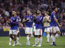 Los jugadores del Manchester United a la finalización del encuentro ante el Atlético de Madrid