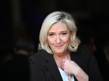 French far-right party Rassemblement National (RN) presidential candidate Marine Le Pen looks on upon her arrival for a campaign visit in Lauris, South of France, on April 15, 2022. - Marine Le Pen will face French President and liberal party La Republique en Marche (LREM) candidate for re-election Emmanuel Macron in a run-off vote on April 24, 2022, after first round voting on April 10. (Photo by CHRISTOPHE SIMON / AFP)