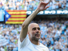 Manchester City's Spanish manager Pep Guardiola waves at the start of the English Premier League football match between Manchester City and Aston Villa at the Etihad Stadium in Manchester, north west England, on May 24, 2026. (Photo by Darren Staples / AFP) / RESTRICTED TO EDITORIAL USE. No use with unauthorized audio, video, data, fixture lists, club/league logos or 'live' services. Online in-match use limited to 120 images. An additional 40 images may be used in extra time. No video emulation. Social media in-match use limited to 120 images. An additional 40 images may be used in extra time. No use in betting publications, games or single club/league/player publications. /