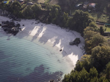 La playa de Galicia que parece el Caribe: aguas cristalinas, arena blanca y una cala que se ha vuelto viral