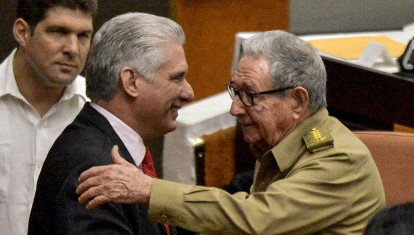 (FILES) In this file photo taken on December 21, 2019, Cuban First Secretary of the Communist Party Raul Castro (R), greets Cuban President Miguel Diaz Canel during the closing of the Fourth Regular Session of the National Assembly of People's Power in its 9th Legislature at the Havana Convention Center. - Cuba's President Miguel Díaz-Canel is expected to be reelected by the parliament for a second and final five-year term on April 19, 2023, presidential elections, amid the communist island's worst economic crisis in three decades. (Photo by YAMIL LAGE / AFP)