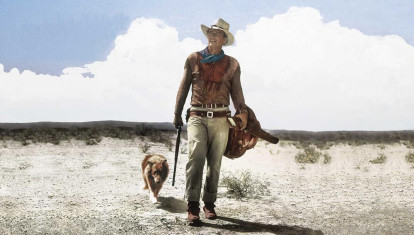 John Wayne, en el rodaje de Hondo