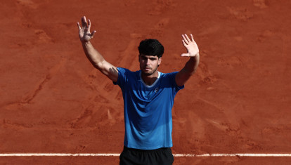 Spain's Carlos Alcaraz celebrates after winning against Monaco's Valentin Vacherot following the Monte Carlo ATP Masters Series Tournament semi-final tennis match on Court Rainier III at the Monte-Carlo Country Club in Roquebrune-Cap-Martin, south-eastern France on April 11, 2026. (Photo by Thibaud MORITZ / AFP)