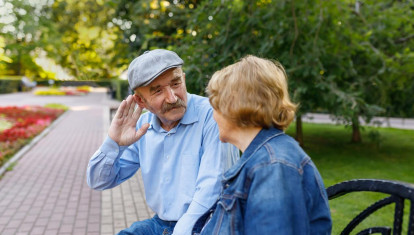 Elderly man tries to hear his spouse. The life of retirees. Hearing problems