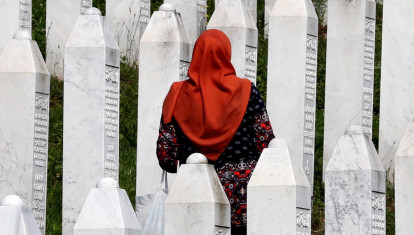 SREBRENICA (Bosnia and Herzegovina), 09/07/2025.- (FILE) - A Bosnian Muslim woman visits gravestones during a funeral ceremony for thirty newly-identified Bosnian Muslim victims, at the Potocari Memorial Center and Cemetery, in Srebrenica, Bosnia and Herzegovina, 11 July 2023 (reissued 09 July 2025). The UN General Assembly designated 11 July as the International Day of Reflection and Commemoration for the 1995 Genocide in Srebrenica perpetrated by the Bosnian Serb army. The massacre led to the killing of at least 8,372 men and boys, the displacement of thousands, and the destruction of entire communities in Srebrenica, which had been designated a safe area by the UN Security Council. (Bosnia-Herzegovina) EFE/EPA/FEHIM DEMIR