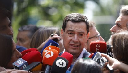 Moreno, a su llegada a la sede del PP en Madrid