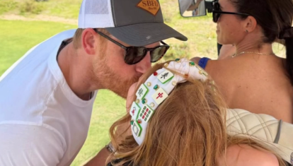 El Príncipe Harry con Meghan Markle y su hija