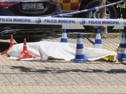 La policía Nacional trabaja en el lugar donde este miércoles ha sido asesinado Andréi Portnov