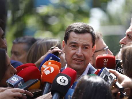 Moreno, a su llegada a la sede del PP en Madrid