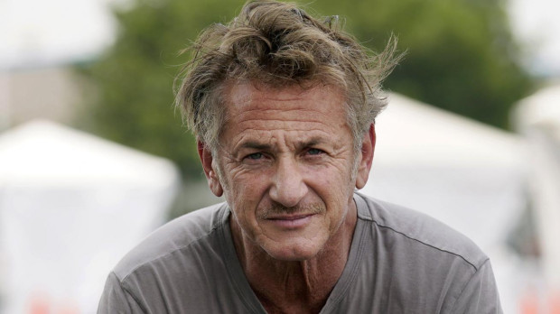 Actor Sean Penn, founder of Community Organized Relief Effort (CORE), is interviewed at a CORE coronavirus testing site at Crenshaw Christian Center, Friday, Aug. 21, 2020, in Los Angeles.