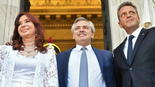 Handout picture released by Argentina's Presidency showing Argentina's President Alberto Fernandez (C), Vice-President Cristina Fernandez de Kirchner (L) and legislator Serio Massa leaving the Congress after the inauguration of the 140th period of ordinary sessions, in Buenos Aires, on March 1, 2022. - Argentina's government on July 28, 2022, appointed the head of the country's lower house of Congress, Sergio Massa, as the new economy "super minister," as Buenos Aires attempts to surmount an economic crisis marked by soaring inflation. Massa's appointment brings together three ministries under his supervision: economy, development and agriculture. (Photo by MARIA EUGENIA CERUTTI / Argentinian Presidency / AFP) / RESTRICTED TO EDITORIAL USE - MANDATORY CREDIT "AFP PHOTO / ARGENTINE PRESIDENCY / MARIA EUGENIA CERUTI" - NO MARKETING - NO ADVERTISING CAMPAIGNS - DISTRIBUTED AS A SERVICE TO CLIENTS