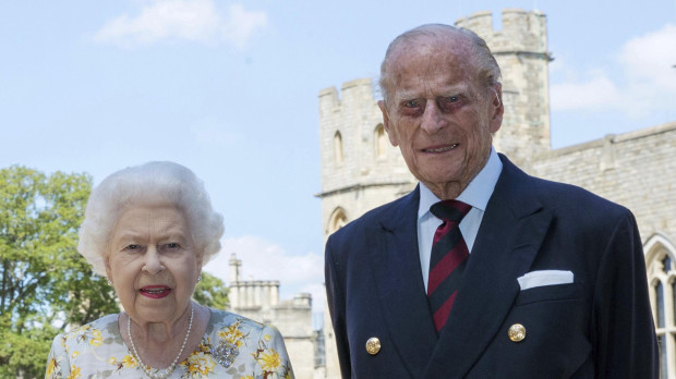 Britain's Queen Elizabeth II and Prince Philip the Duke of Edinburgh for a photo June 1, 2020, in Windsor, England, ahead of his 99th birthday on Wednesday.