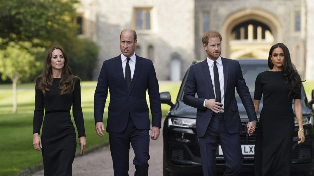 Britain's Prince William and Kate Middleton , Princess of Wales, with Britain's Prince Harry and Meghan Markle , Duchess of Sussex following the death of Queen Elizabeth II in Windsor, England, Saturday, Sept. 10, 2022.