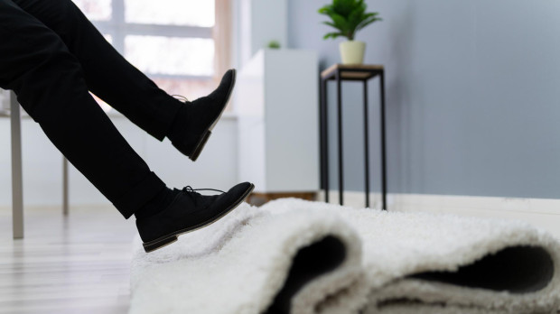 Low Section Of Man Legs Stumbling With A Carpet In The Living Room At Home.Man,Legs,Stumbling,With,A,Carpet,carpet, stumble, man, legs, fallen, person, home, fall,carpet, stumble, man, legs, fallen, person, home, fall, clumsy, falldown, accident, slipping, leg, room, business, floor, injury, house, living, risk, mistake, rug, men, professional, executive, trouble, businessman, young, hardwood, male, residential, human, footwear, careless, danger, residence, one, caucasian, lowsection, bodypart, stumbling, midair, formalwear