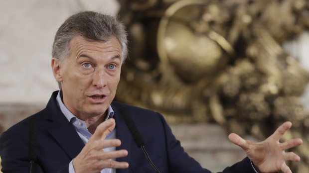 Argentina's President Mauricio Macri talks at a press conference in Buenos Aires, Argentina, Monday, Oct. 23, 2017.
