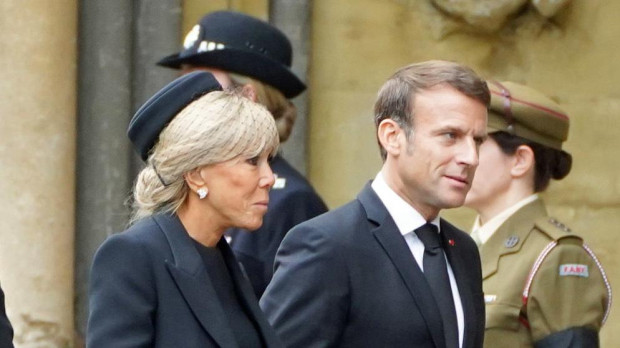 French President Emmanuel Macron and Brigitte Macron during State Funeral of Queen Elizabeth II on September 19, 2022 in London, England.