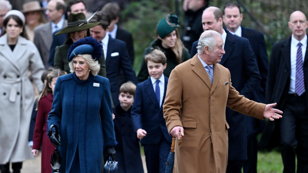 Camilla Queen Consort and King Charles III followed by Princess Charlotte, Catherine Princess of Wales, Prince Louis, Prince George and Prince William attending the Christmas day in Sandringham in Norfolk, England, Sunday, Dec. 25, 2022.