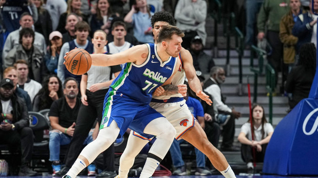 DALLAS, TX - DECEMBER 27: Luka Doncic #77 of the Dallas Mavericks drives to the basket against the New York Knicks on December 27, 2022 at the American Airlines Center in Dallas, Texas. NOTE TO USER: User expressly acknowledges and agrees that, by downloading and or using this photograph, User is consenting to the terms and conditions of the Getty Images License Agreement. Mandatory Copyright Notice: Copyright 2022 NBAE Glenn James/NBAE via Getty Images/AFP (Photo by Glenn James / NBAE / Getty Images / Getty Images via AFP)