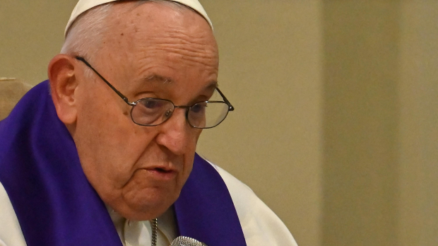 Pope Francis speaks as he presides over the