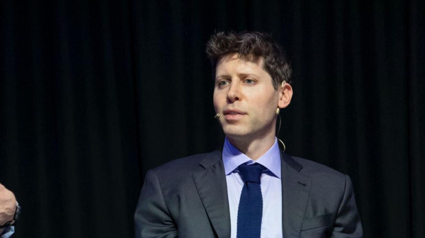 Sam Altman junto a Joe Haslam, profesor de la Universidad