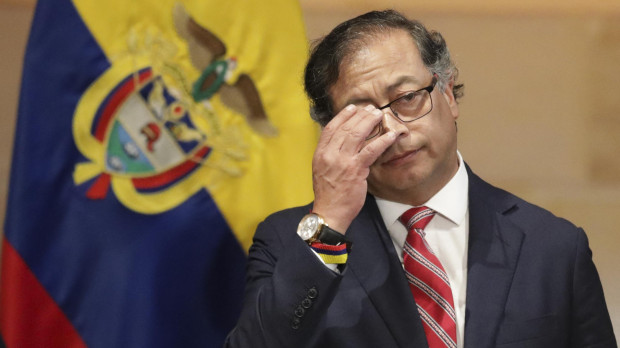 Colombian President Gustavo Petro gestures as he delivers a speech during the installation of the ordinary sessions of the Congress in Bogota on July 20, 2023. (Photo by Juan Pablo Pino / AFP)
