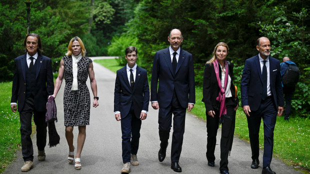(R/L): Bulgaria's Prince Kyril of Preslav, Rosario Nadal, Prince Konstantin-Assen of Vidin, Simeon-Hassan Munoz, Princess Kalina and her husband Kitin Munoz attend the funeral ceremony of King Ferdinand I of Bulgaria in Vrana Palace in Sofia on May 29, 2024. The remains of Ferdinand, Bulgaria's first king after five centuries of Ottoman rule, were repatriated to be reburied 76 years after his death in Germany. After a liturgical service in accordance with the Catholic and Orthodox rites, Ferdinand (1887-1948) has been buried in the family crypt at the Vranya palace, where Simeon of Saxe-Coburg Gotha, the last Bulgarian king to be ousted by the communist regime in 1946 at the age of 9, currently lives. (Photo by Nikolay DOYCHINOV / AFP)