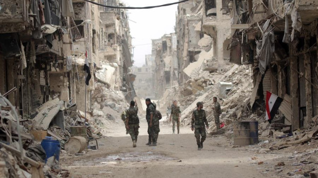 Soldados sirios en el distrito Yarmouk Camp, al sur de Damasco