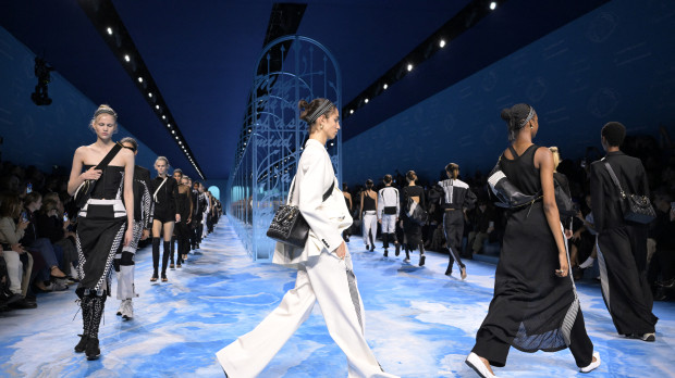 Models walk on the catwalk after the presentation by Dior for the Women Ready-to-wear Spring-Summer 2025 collection as part of the Paris Fashion Week, in Paris on September 24, 2024. (Photo by Bertrand GUAY / AFP)