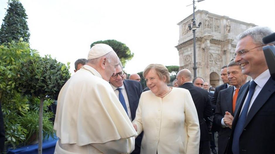 Angela Merkel y el Papa Francisco en el encuentro interreligioso organizado por Sant`Egidio