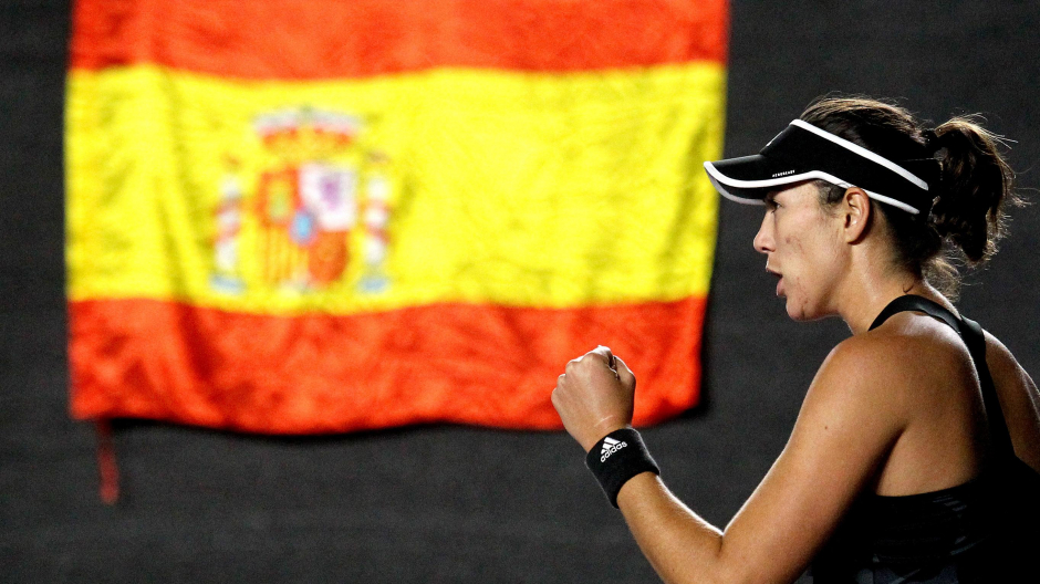 Spain's Garbine Muguruza reacts as she wins a set against Estonia's Anett Kontaveit during their 2021 WTA Finals Tournament singles final match in Zapopan, Mexico, on November 17, 2021. (Photo by Ulises Ruiz / AFP)
