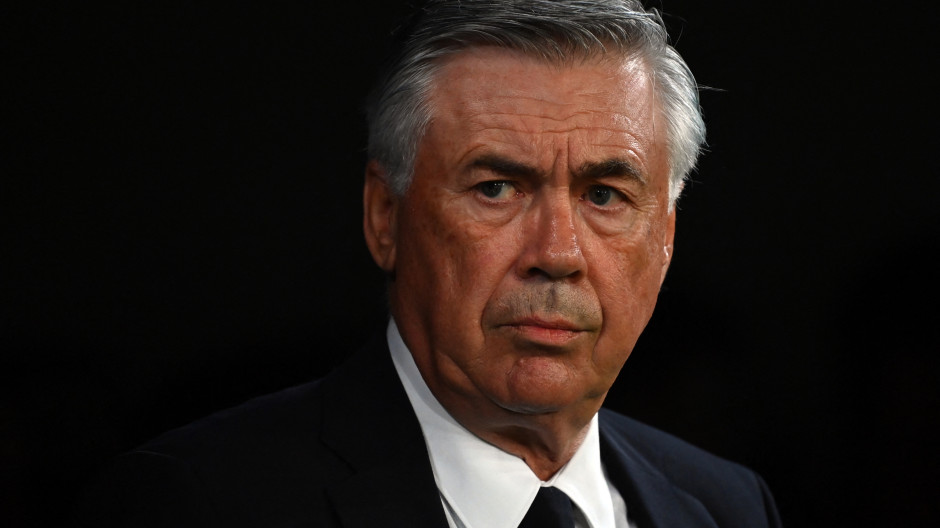 Real Madrid's Italian coach Carlo Ancelotti looks on before the Spanish League football match between Real Madrid and Villarreal CF at the Santiago Bernabeu stadium in Madrid on September 25, 2021. (Photo by GABRIEL BOUYS / AFP)