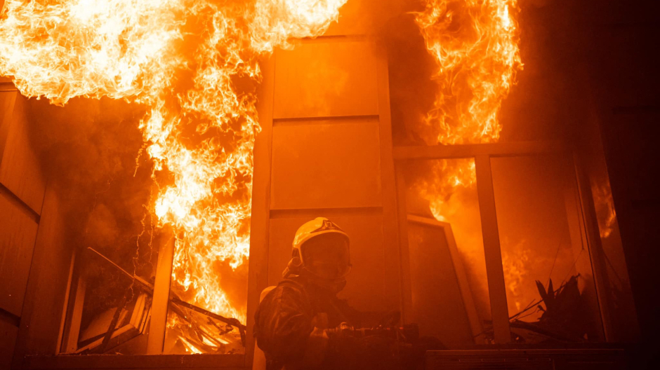 This handout photograph taken and released by Ukrainian Emergency Service on July 20, 2023 shows rescuers extinguishing a fire in an administrative building in Odesa as a result of missile strike, amid the Russian invasion in Ukraine. (Photo by Handout / Ukraine Emergency Service / AFP) / RESTRICTED TO EDITORIAL USE - MANDATORY CREDIT "AFP PHOTO /   " - NO MARKETING NO ADVERTISING CAMPAIGNS - DISTRIBUTED AS A SERVICE TO CLIENTS