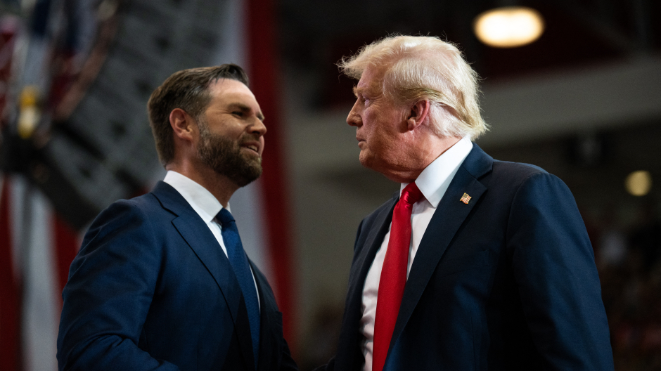 ST CLOUD, MINNESOTA - JULY 27: Republican vice presidential nominee U.S. Sen. J.D. Vance (R-OH) introduces U.S. Republican Presidential nominee former President Donald Trump during a rally at Herb Brooks National Hockey Center on July 27, 2024 in St Cloud, Minnesota. Trump hopes to flip the state of Minnesota this November, which hasn't been carried by a Republican in a presidential election since 1972.   Stephen Maturen/Getty Images/AFP (Photo by Stephen Maturen / GETTY IMAGES NORTH AMERICA / Getty Images via AFP)