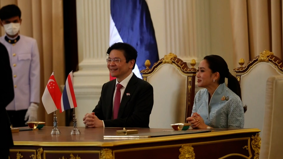 Imagen de la ceremonia de bienvenida al primer ministro de Singapur en la Casa de Gobierno de Bangkok