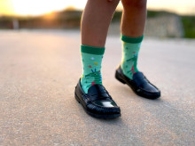 cultura/20260418/calcetines-dragon_408100