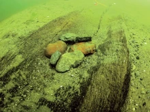 ciencia/20261017/buzo-encontraba-explorando-lago-cuando-descubrio-algo-llevaba-oculto-5000-anos_468703