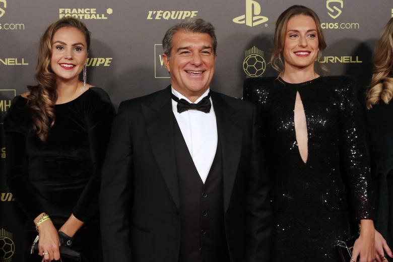 CEO FC Barcelona president Joan Laporta with Lieke Martens and  Alexia Putellas during the 65th Ballon d'Or ceremony at Theatre du Chatelet, in Paris, Monday, Nov. 29, 2021
