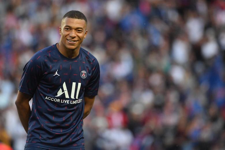 Paris Saint-Germain's French forward Kylian Mbappe announces he will stay at PSG until 2025 before the French L1 football match between Paris Saint-Germain PSG and Metz at the Parc des Princes stadium in Paris on May 21, 2022. Photo by Christian Liewig/ABACAPRESS.COM