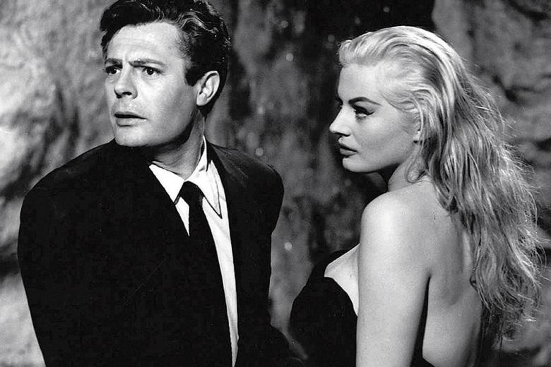 Fotograma de `La dolce vita´ de Federico Fellini, con Marcello Mastroianni y Anita Ekberg