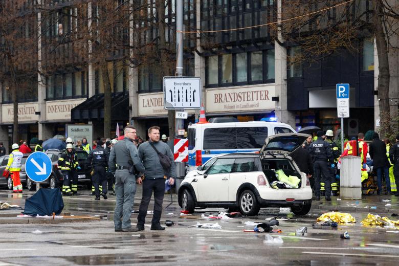 Police cordon off the scene where a car drove into a crowd in the southern German city of Munich on February 13, 2025 leaving several people injured, police said. Munich police said on social media platform X that "several people were injured" after "a car drove into a group of people" in the centre of the Bavarian state capital. (Photo by Michaela STACHE / AFP)