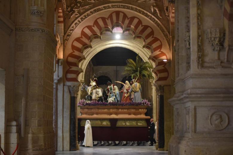 La procesión de la Hermandad de la Entrada Triunfal, en imágenes