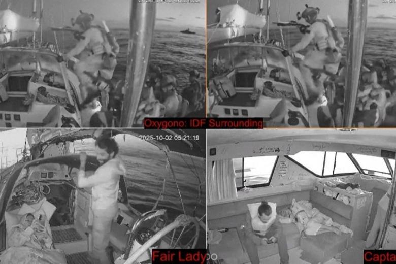 This video grab taken from a livestream broadcasted on October 2, 2025 by the Global Sumud Flotilla shows Israeli navy soldiers (up) boarding the vessel 'Oxygono', one of the Sumud flotilla boats, aiming at breaking the Israeli blockade of the Gaza Strip. Israel said on October 2, 2025 it will deport pro-Palestinian activists on an aid flotilla intercepted at sea as they headed towards Gaza, adding that none of the vessels had successfully breached its maritime blockade. According to Greek Foreign Minister George Gerapetritis, 39 of the around 45 ships have been intercepted and were headed to the Israeli port city of Ashdod, according to state broadcaster ERT. (Photo by Handout / Global Sumud Flotilla / AFP) / RESTRICTED TO EDITORIAL USE - MANDATORY CREDIT "AFP PHOTO / GLOBAL SUMUD FLOTILLA" - HANDOUT - NO MARKETING NO ADVERTISING CAMPAIGNS - DISTRIBUTED AS A SERVICE TO CLIENTS