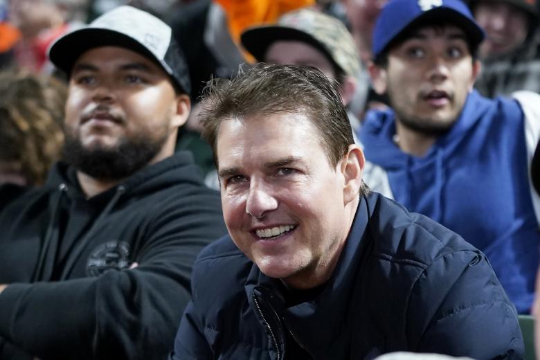 Actor Tom Cruise, middle right, during Game 2 of a baseball National League Division Series between the San FranciscoGiants and the LosAngelesDodgers Saturday, Oct. 9, 2021, in San Francisco.